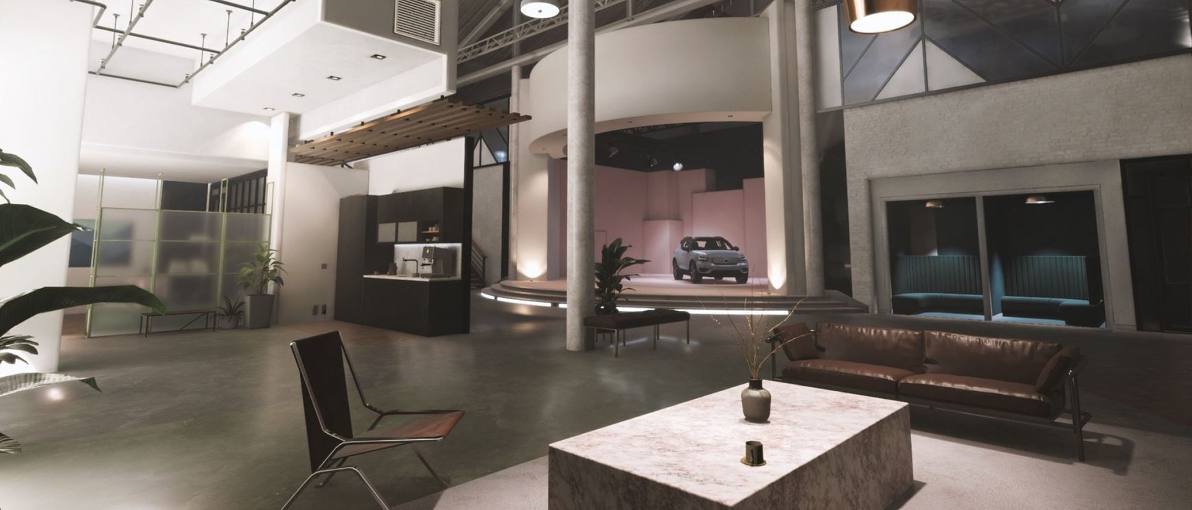 An industrial office with a car model on a small stage.